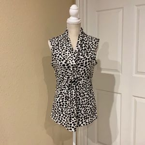 Carmen Marc Valvo sleeveless top. V-neck, poly/spandex Sz Large